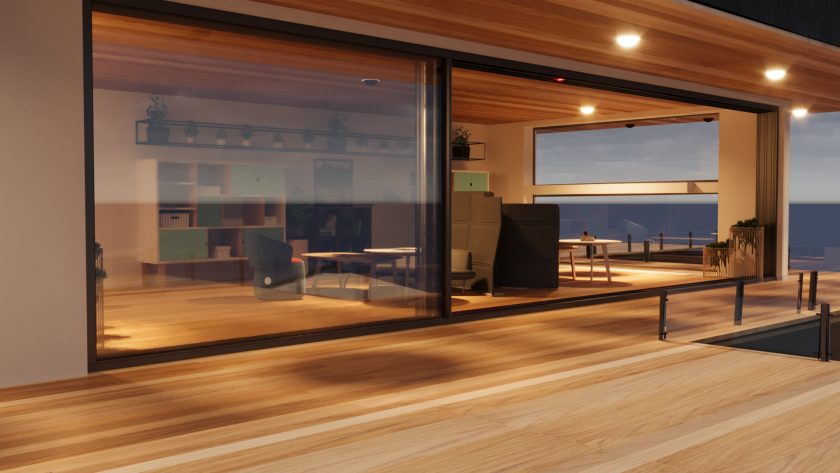 Modern interior with frameless aluminium windows and slim aluminium sliding panels, blending indoor and outdoor spaces.