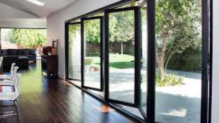 Elegant PTT1515 aluminium windows in a spacious room, offering bright natural lighting and garden views