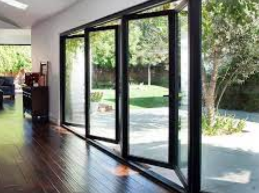 Elegant PTT1515 aluminium windows in a spacious room, offering bright natural lighting and garden views
