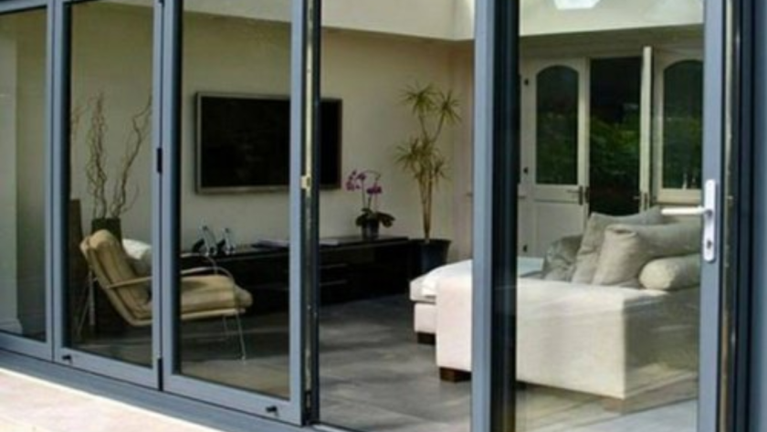 Modern sliding anodised aluminium windows in residential setting