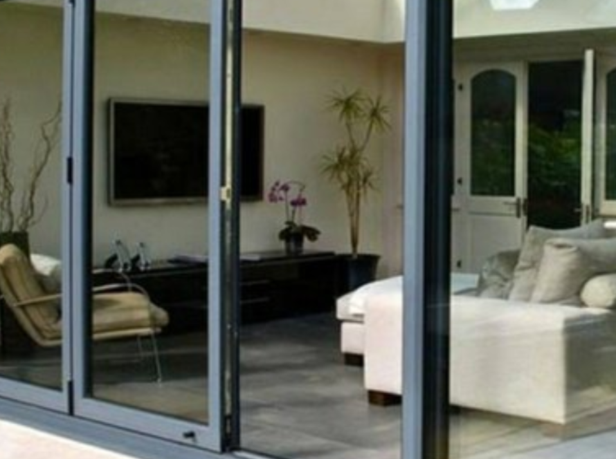 Modern sliding anodised aluminium windows in residential setting