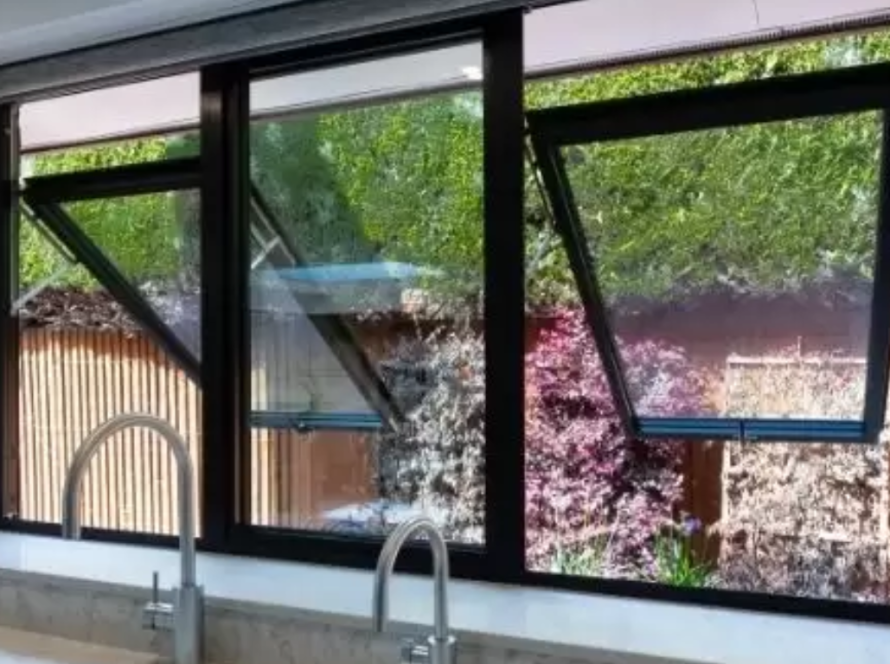 Top hung aluminium windows offering excellent ventilation and garden views