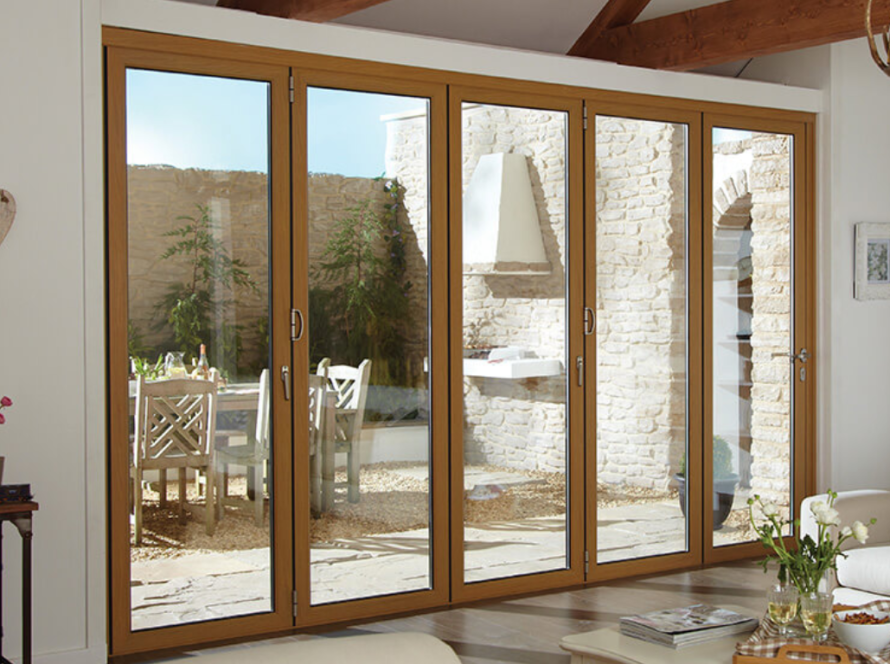 Elegant room featuring wood effect aluminium windows with natural timber finish frames