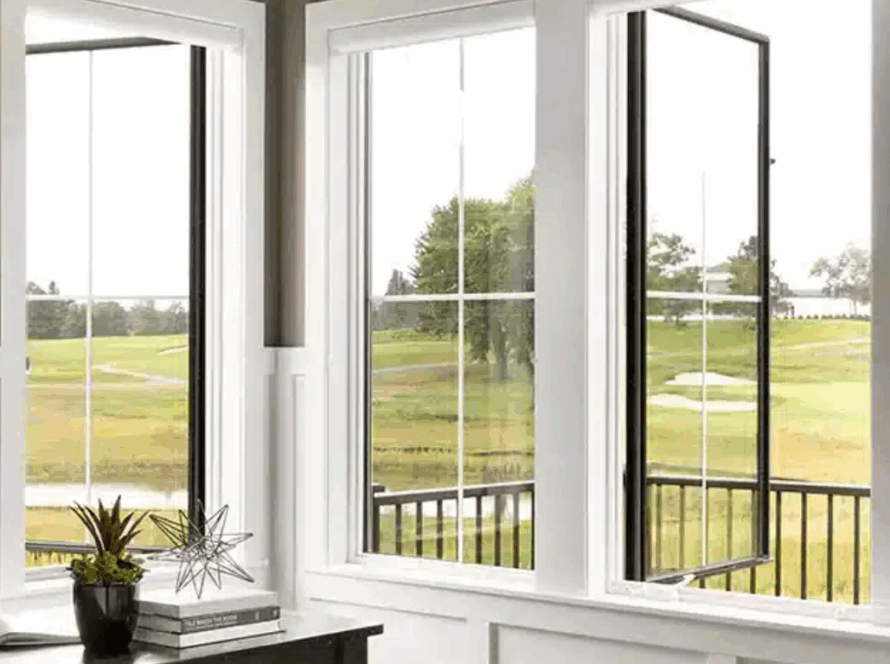 White casement picture window combination with wide fixed center pane and operable side windows overlooking a golf course
