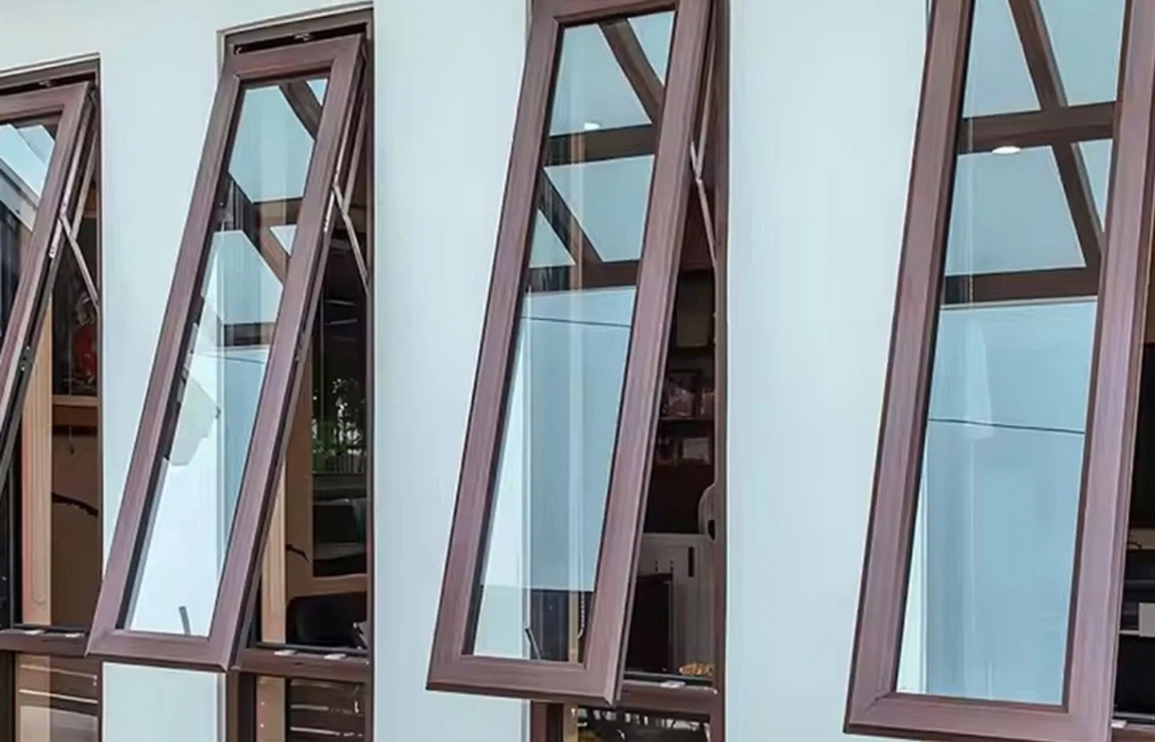 Aluminium awning windows opening outward on modern exterior wall