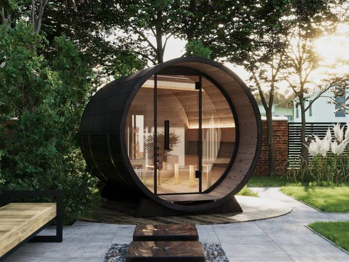 Medium ThermoWood barrel sauna in garden setting