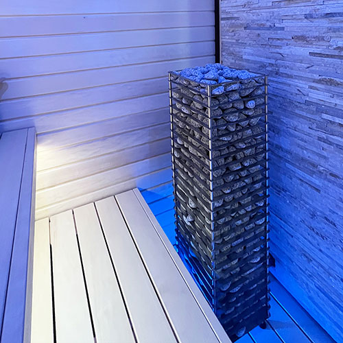 HUUM CLIFF sauna heater installed in a sauna room