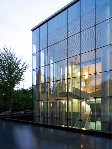 Contemporary glass façade featuring expansive double glazing window units, designed to maximize natural light while maintaining energy efficiency in a modern architectural structure.