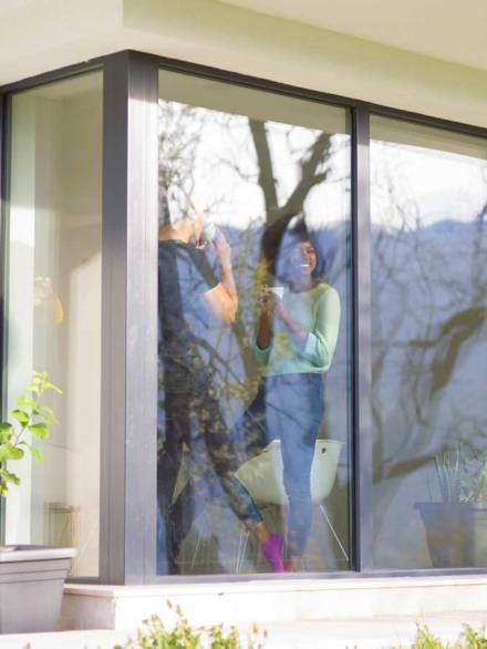 Modern aluminium window with double glazing, showcasing cross-section of the aluminium window frame structure